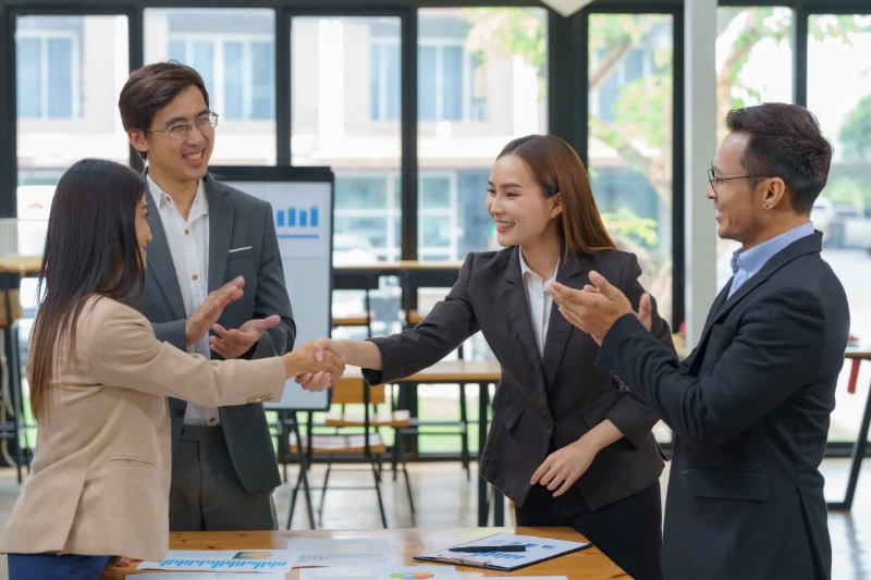 people shaking hands